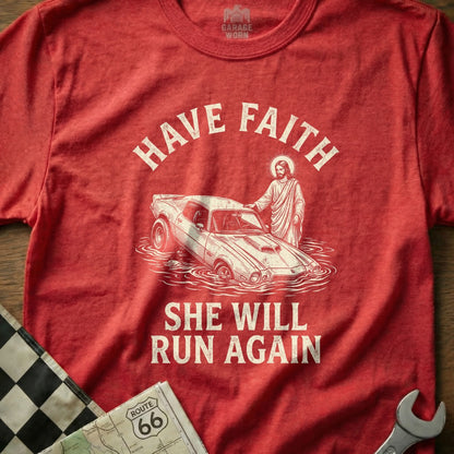 Red t-shirt with "Have Faith She Will Run Again" and Jesus helping a car.