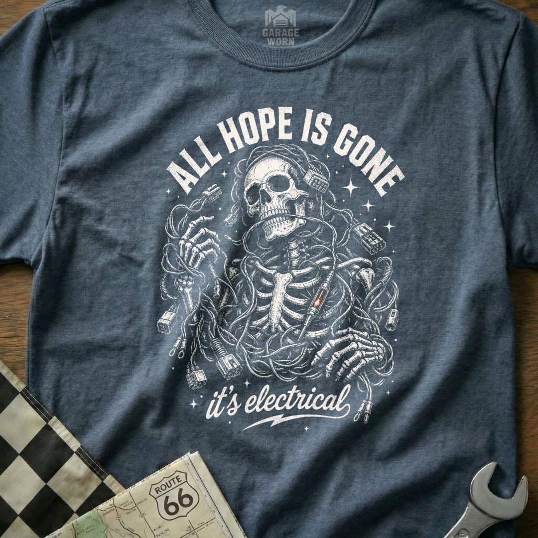 Skeleton tangled in wires on a shirt with "ALL HOPE IS GONE it's electrical".