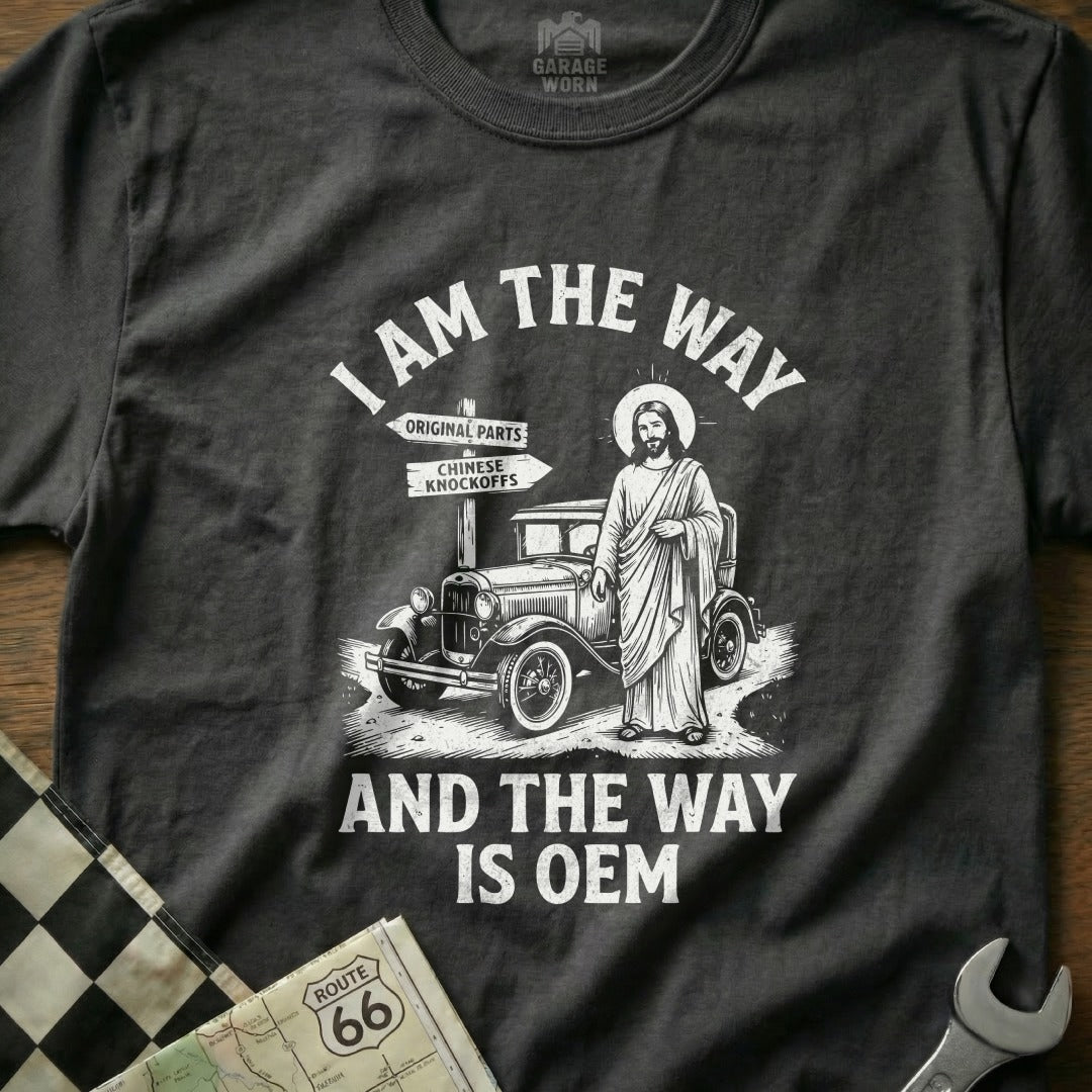 T-shirt with Jesus, classic car, and text about OEM vs. knockoffs.