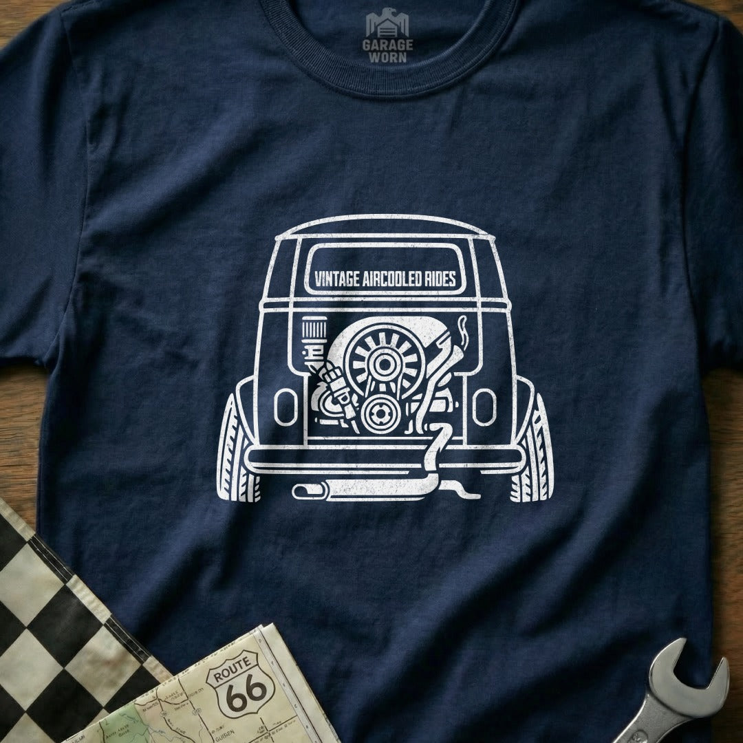 Dark blue t-shirt with white graphic of a vintage air-cooled engine in a vehicle rear.