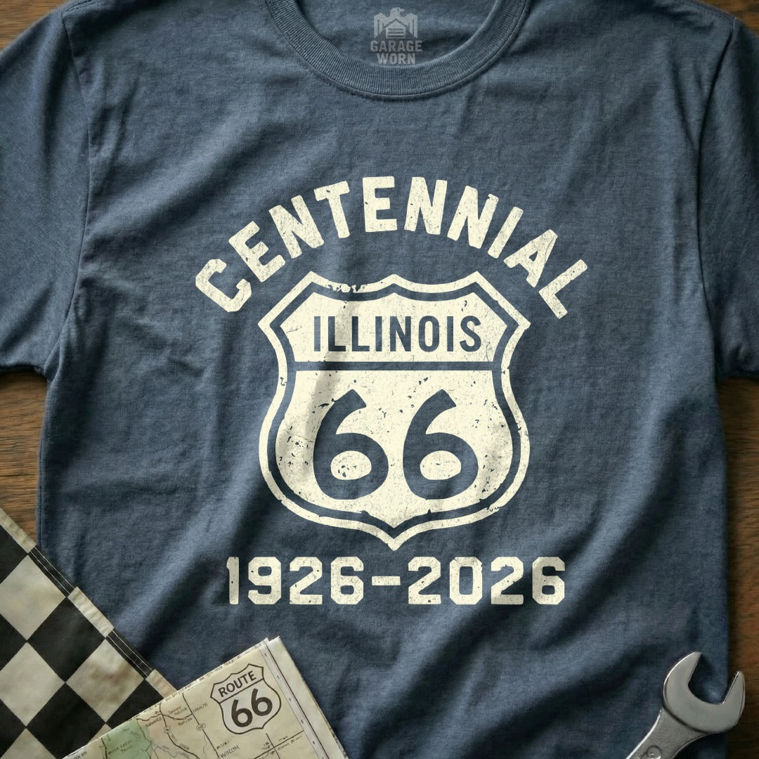 Centennial Illinois Route 66 1926-2026 emblem on a blue t-shirt.