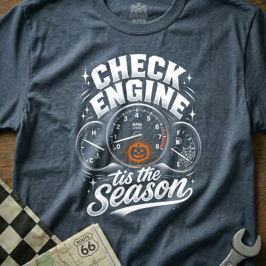 T-shirt with "Check Engine 'tis the Season" text and Halloween-themed gauges.