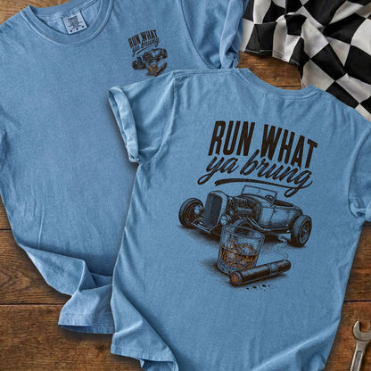 Blue t-shirt with "RUN WHAT ya bring" text, hot rod, whiskey, and cigar illustration.
