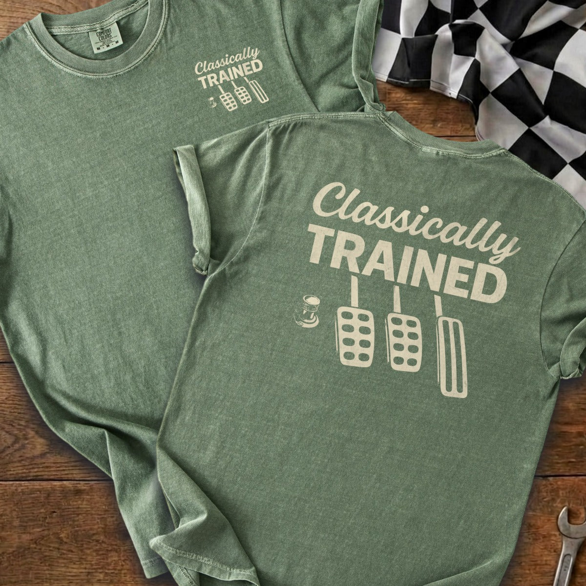 Green t-shirt with "Classically Trained" text and pedal graphic.