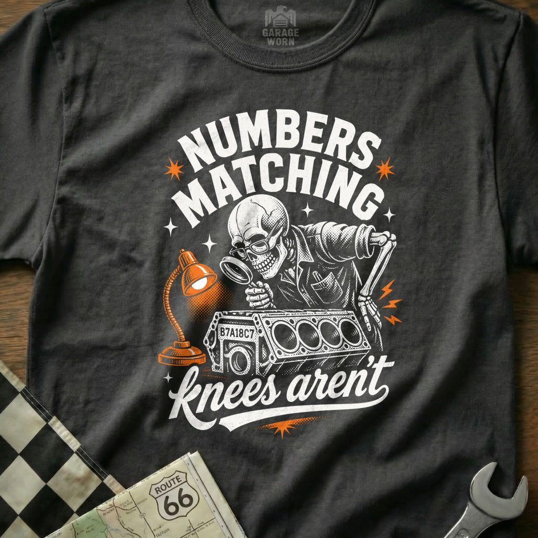 Skeleton examining engine parts with magnifying glass, text "Numbers Matching" and "knees aren't".