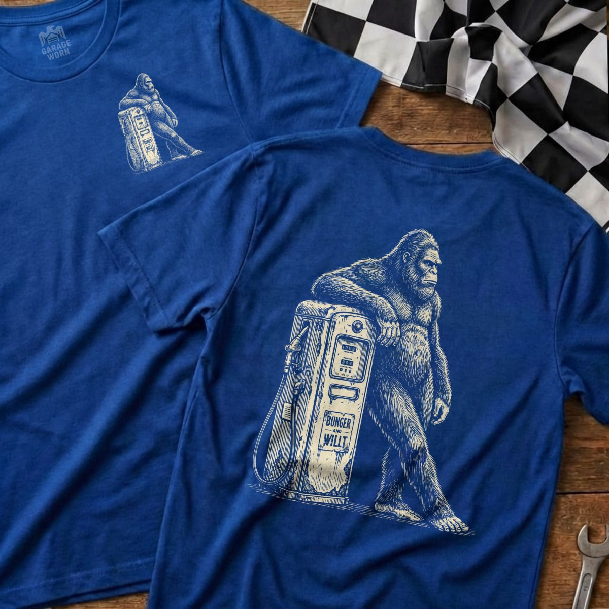 Blue t-shirt with Bigfoot leaning on a vintage gas pump, "BUNGER WILLT" text.