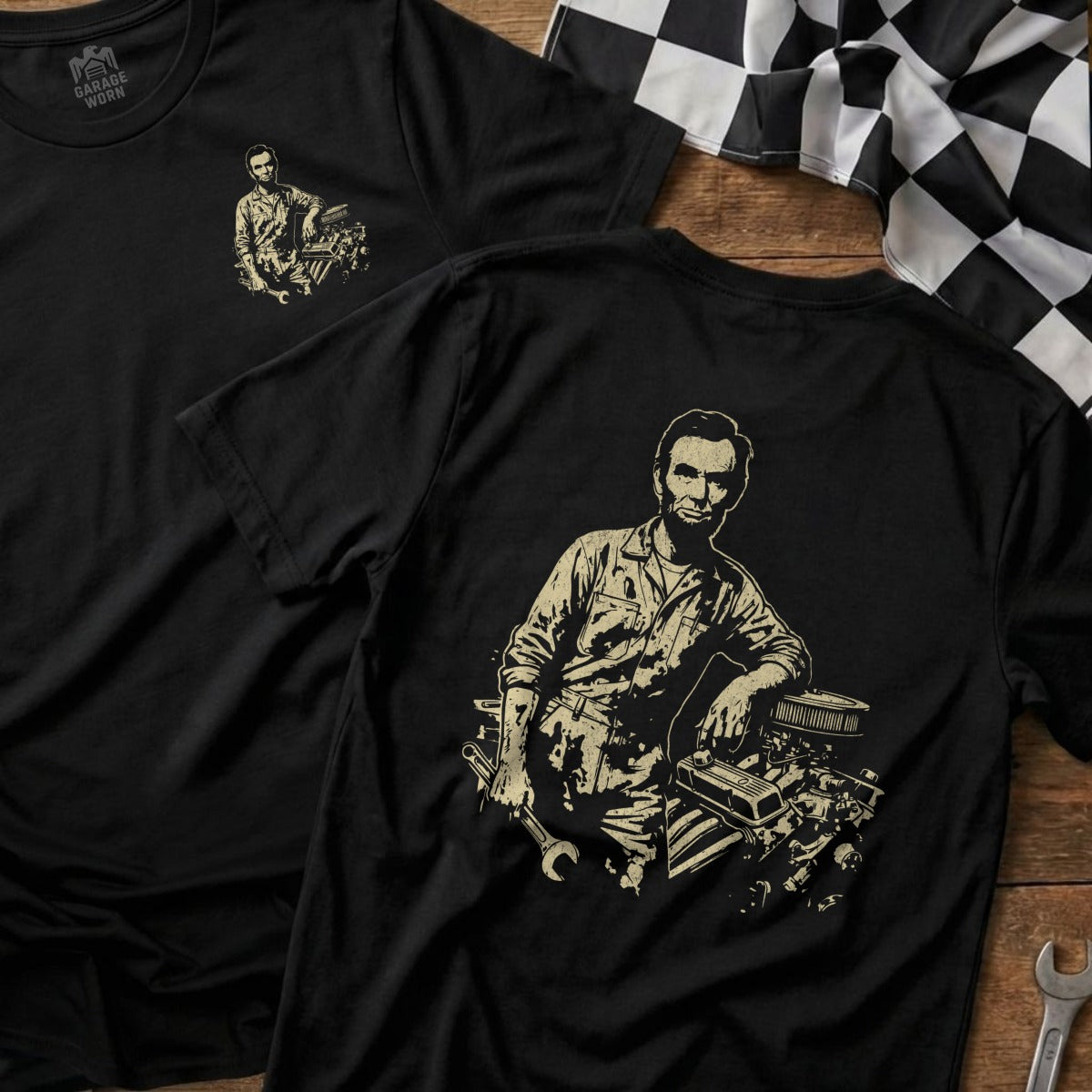 Black t-shirt with Abraham Lincoln leaning on a car engine graphic.
