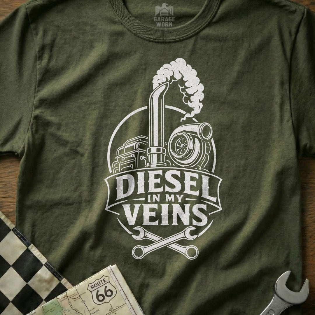 Olive green t-shirt with white graphic of diesel engine parts and text "DIESEL IN MY VEINS".