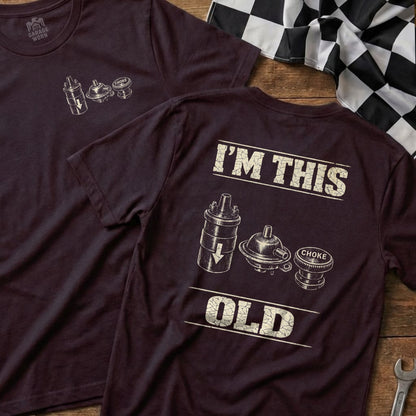 Dark t-shirt with "I'M THIS OLD" and vintage carburetor illustration.