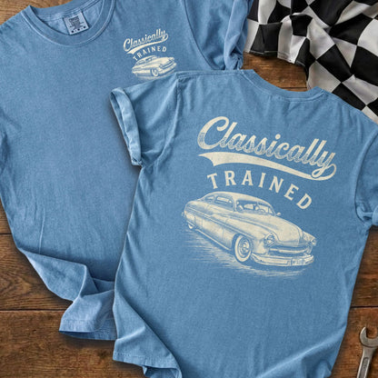 Blue t-shirt with "Classically TRAINED" text and vintage car graphic.