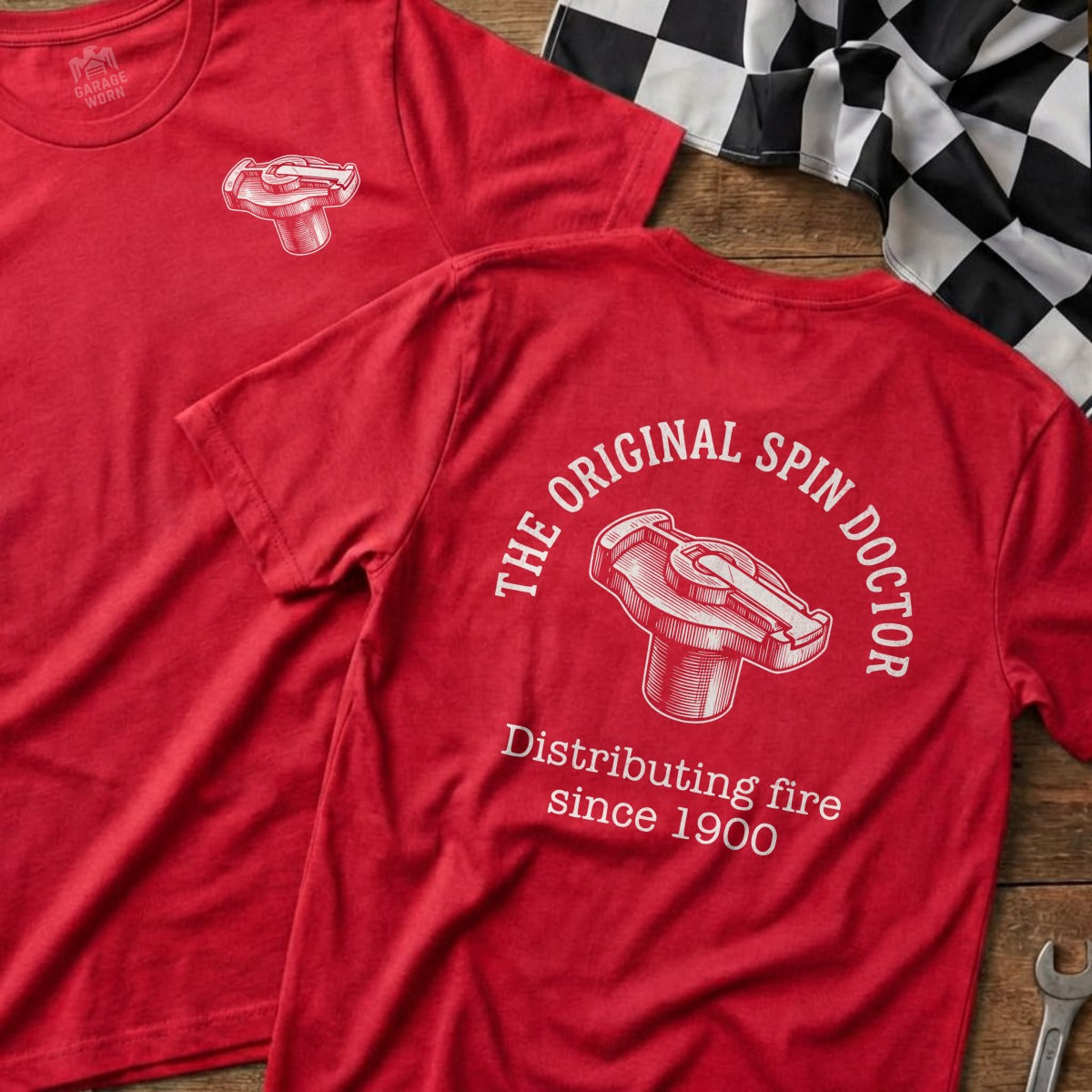 Red t-shirt with "The Original Spin Doctor" and distributor graphic.