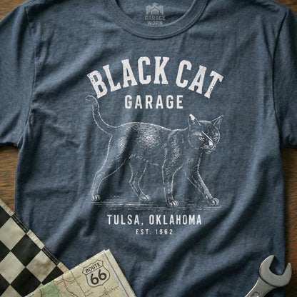 Dark grey t-shirt with distressed "Black Cat Garage Tulsa, Oklahoma Est. 1962" graphic.