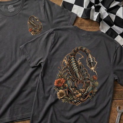 Dark grey t-shirts featuring a detailed scorpion illustration with a spark plug and flowers.