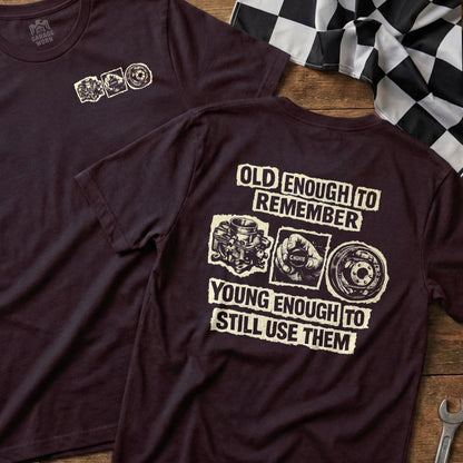 T-shirt with "Old enough to remember, young enough to still use them" and engine parts.