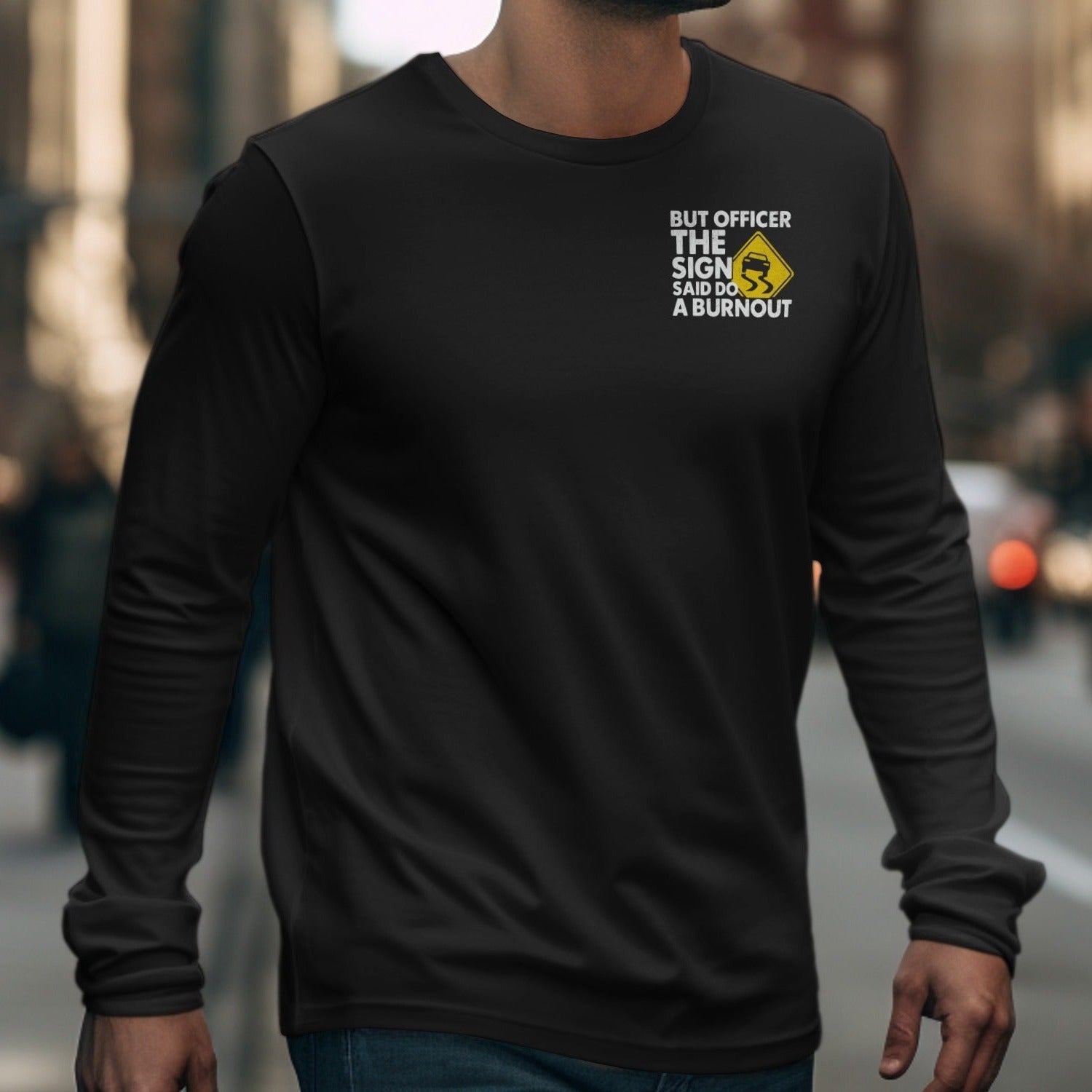 Black long-sleeve shirt with "But Officer The Sign Said Do A Burnout" and skid mark graphic.