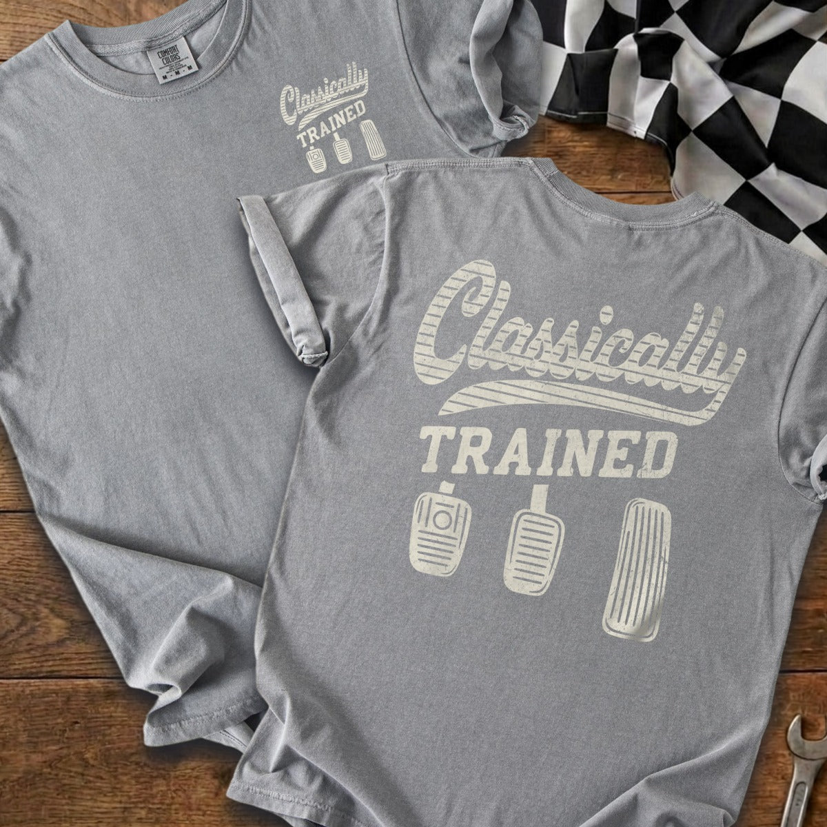 Gray t-shirt with "Classically TRAINED" and three pedals graphic.