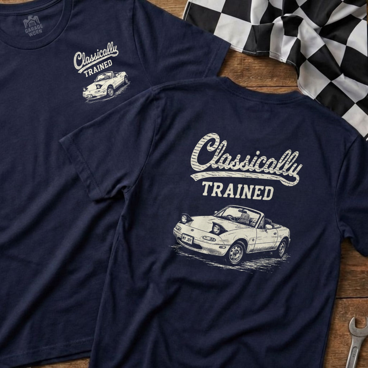 Navy t-shirt with "Classically TRAINED" graphic and a white Miata car illustration.
