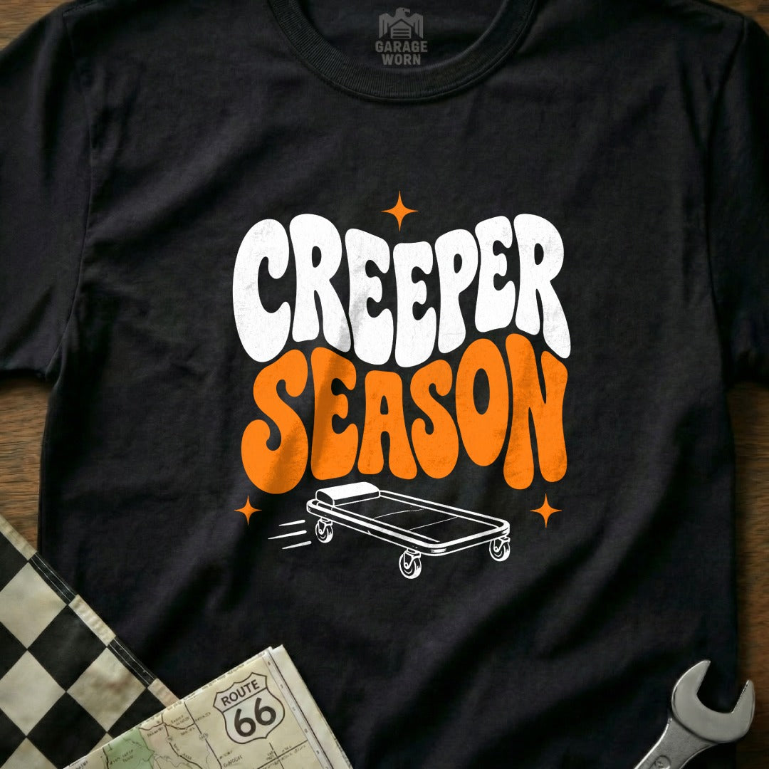 Black t-shirt with "CREEPER SEASON" text and a rolling creeper.
