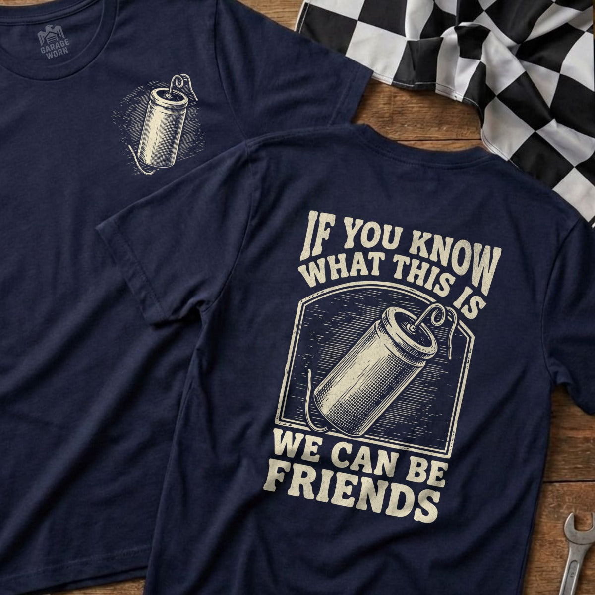 Navy t-shirt with a graphic of a firecracker and text "IF YOU KNOW WHAT THIS IS WE CAN BE FRIENDS".