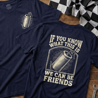 Navy t-shirt with a graphic of a firecracker and text "IF YOU KNOW WHAT THIS IS WE CAN BE FRIENDS".