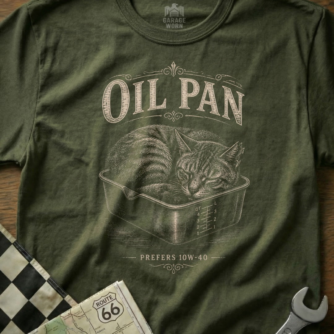 Green t-shirt graphic featuring a cat sleeping in an oil pan with text "OIL PAN Prefers 10W-40".