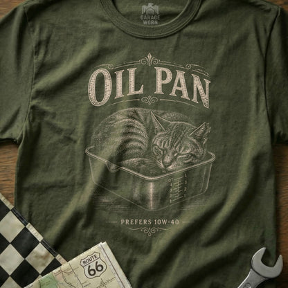 Green t-shirt graphic featuring a cat sleeping in an oil pan with text "OIL PAN Prefers 10W-40".