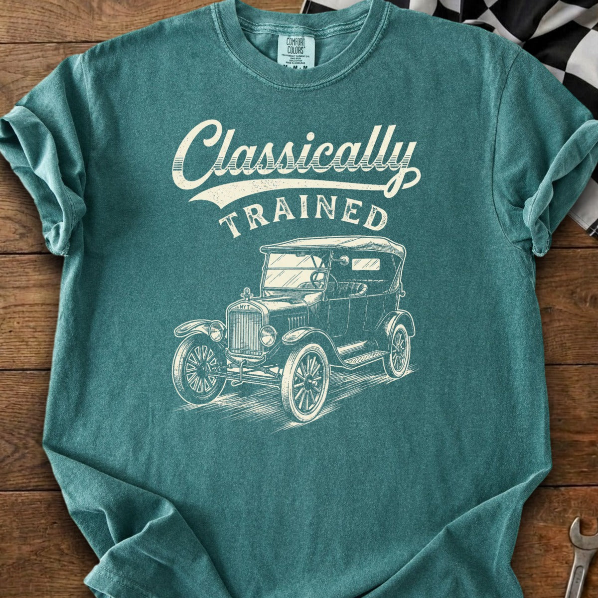 Teal t-shirt with "Classically Trained" text and vintage car illustration.
