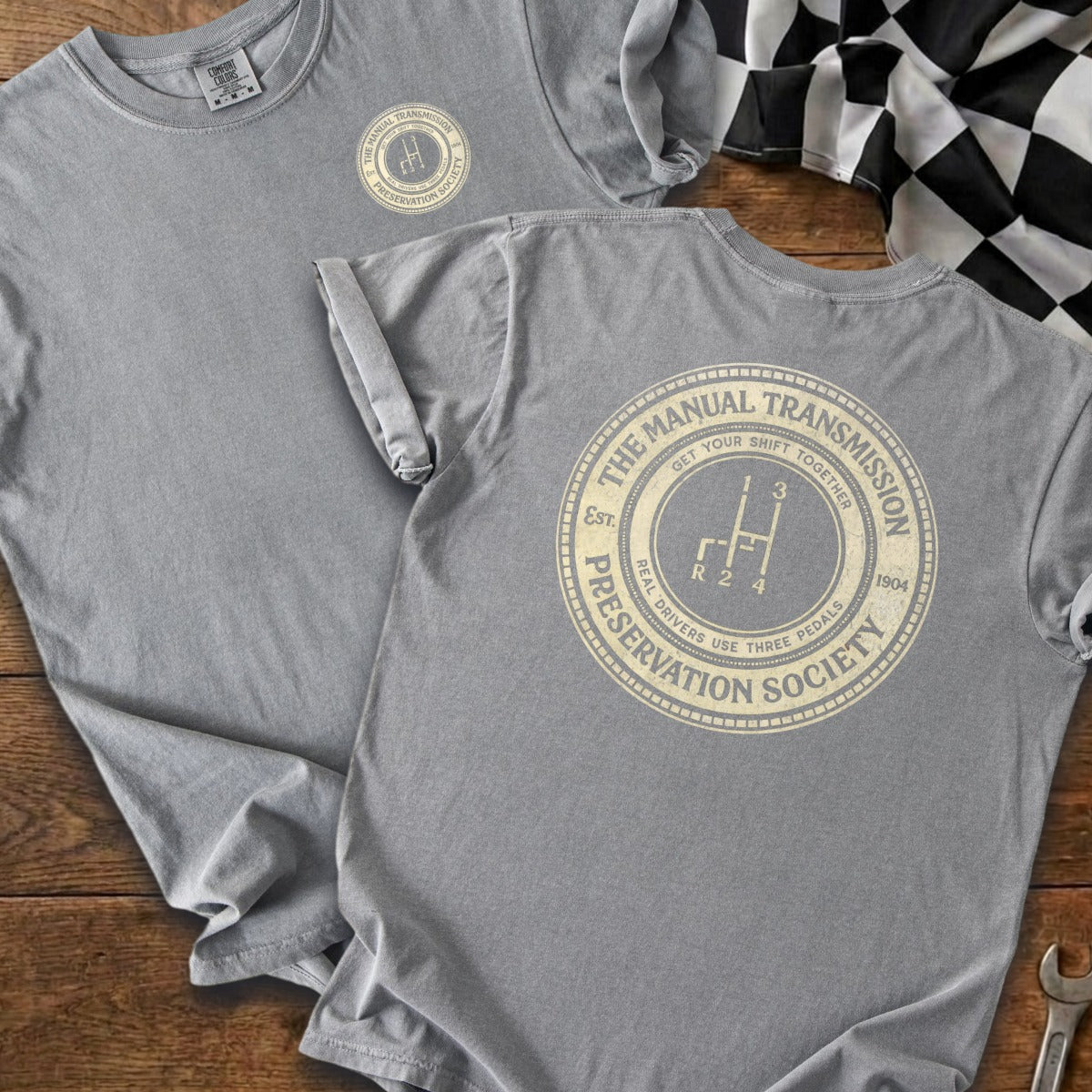 Gray t-shirt with "The Manual Transmission Preservation Society" stamped design.