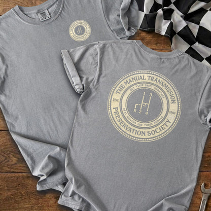 Gray t-shirt with "The Manual Transmission Preservation Society" stamped design.