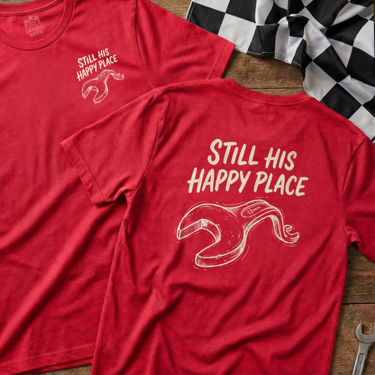 Red t-shirt with "Still His Happy Place" and wrench graphic.