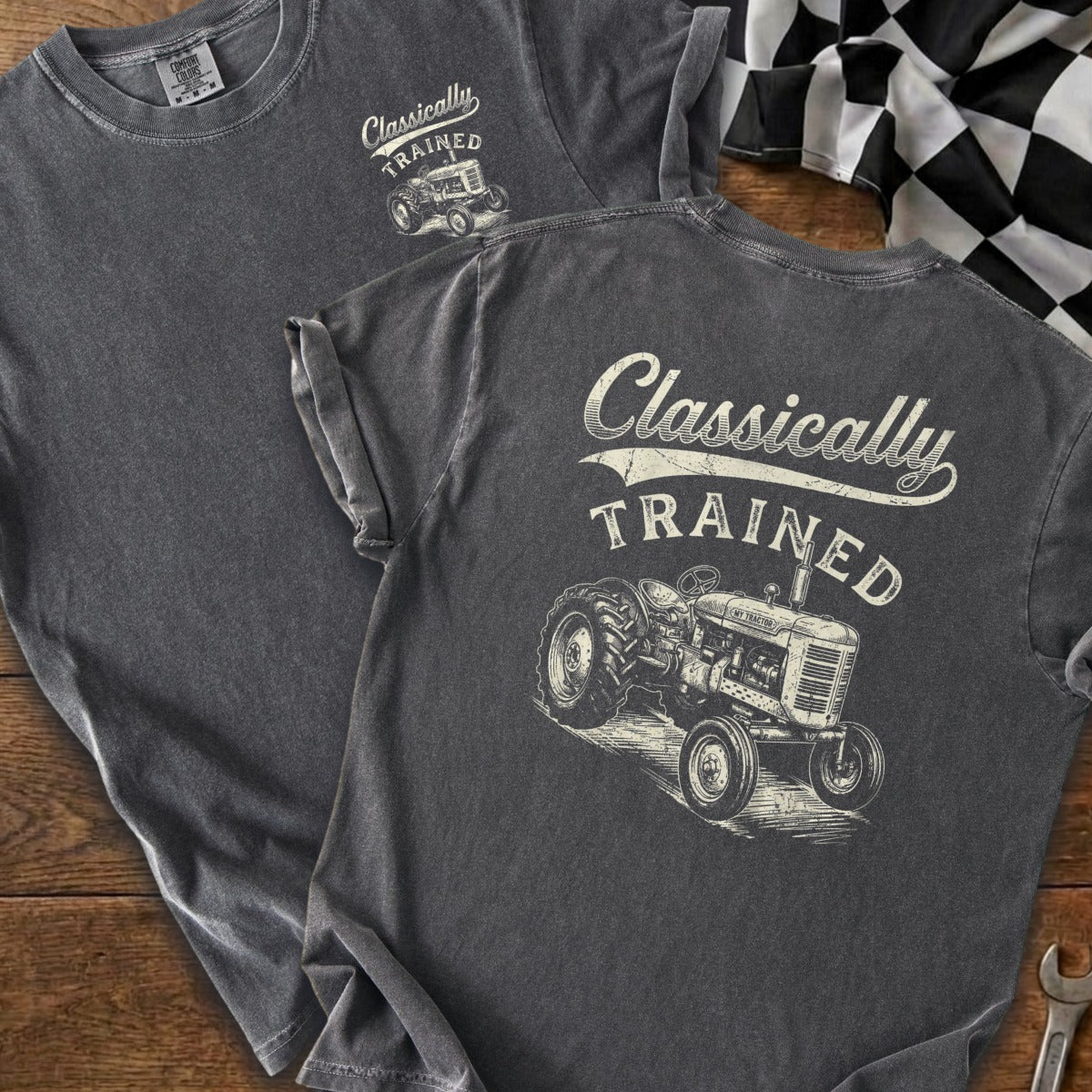 T-shirt with "Classically TRAINED" text and vintage tractor graphic.