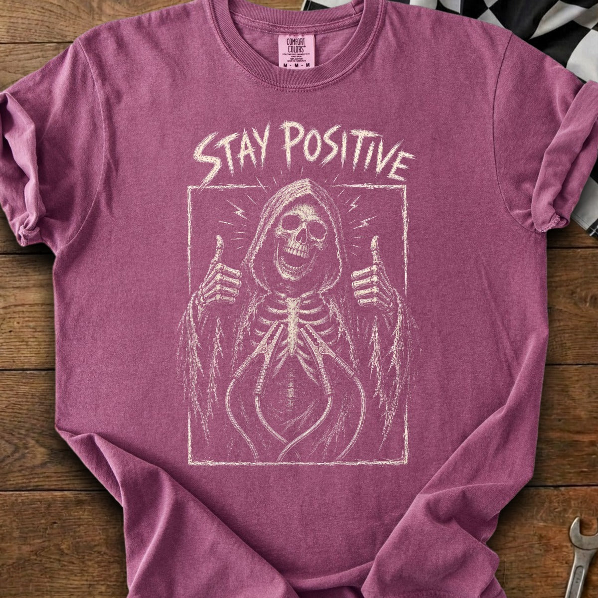 T-shirt with grim reaper holding jumper cables and giving thumbs up.
