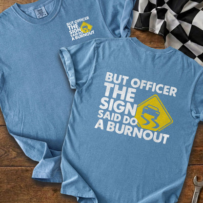 Blue t-shirt with white text "But Officer the Sign Said Do A Burnout".