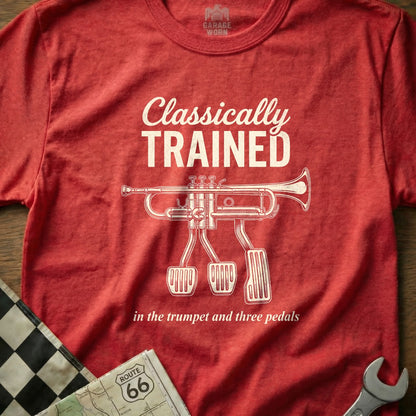 Red t-shirt with "Classically Trained" and a trumpet with three pedals.