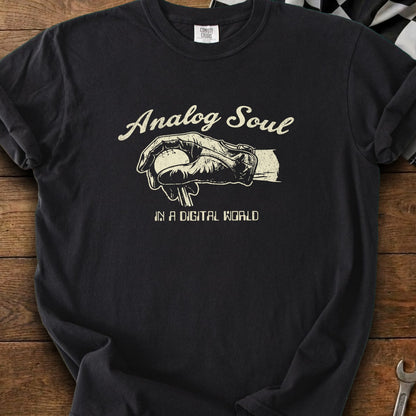 Black t-shirt with "Analog Soul in a Digital World" text and baseball graphic.