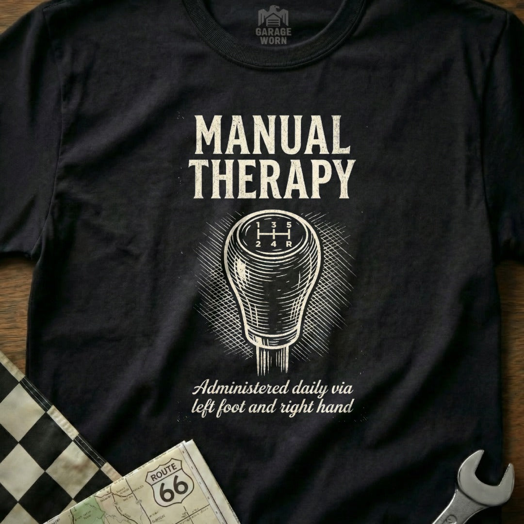 Black t-shirt with "Manual Therapy" and gear shift graphic.