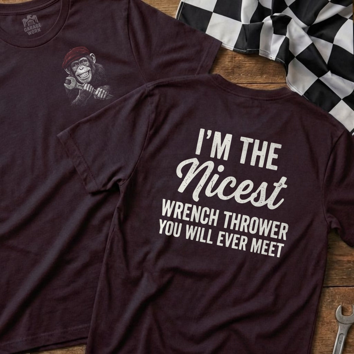 Maroon t-shirt with monkey graphic on front, "I'm the Nicest Wrench Thrower You Will Ever Meet" on back.