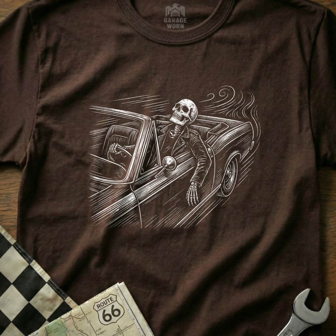 Skeleton driving a classic convertible with Route 66 map and checkered flag.