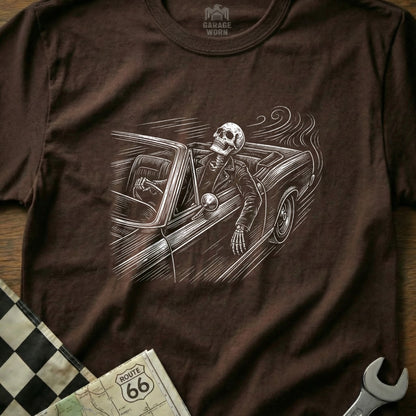 Skeleton driving a classic convertible with Route 66 map and checkered flag.