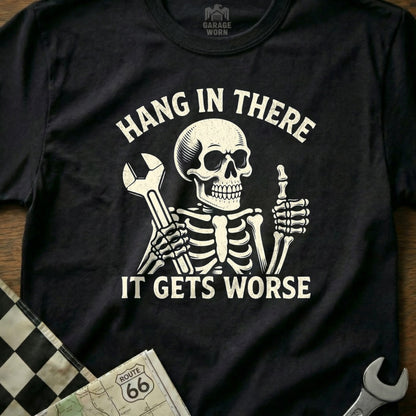 Skeleton giving a thumbs up with a wrench, text "Hang in there, it gets worse."