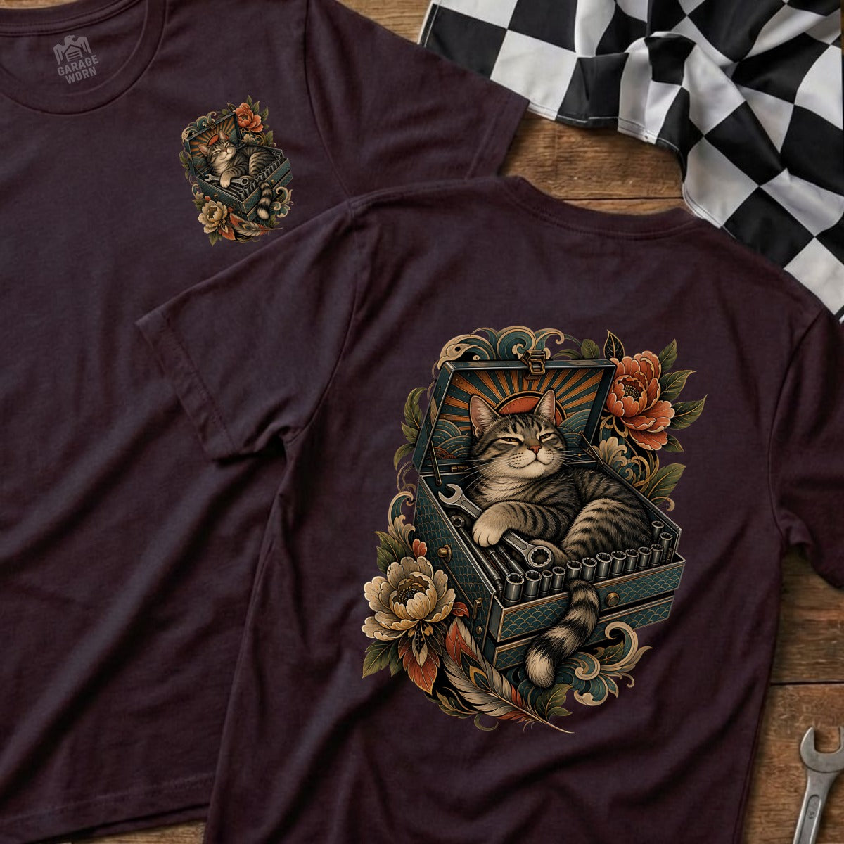 T-shirt with a tabby cat resting in an open toolbox with tools and flowers.