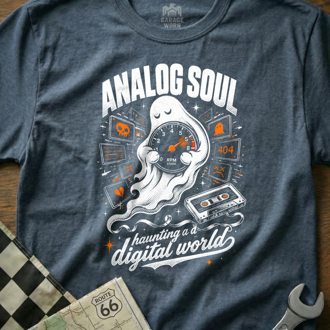 T-shirt graphic: Ghost holding tachometer, "Analog Soul" and "haunting a digital world".