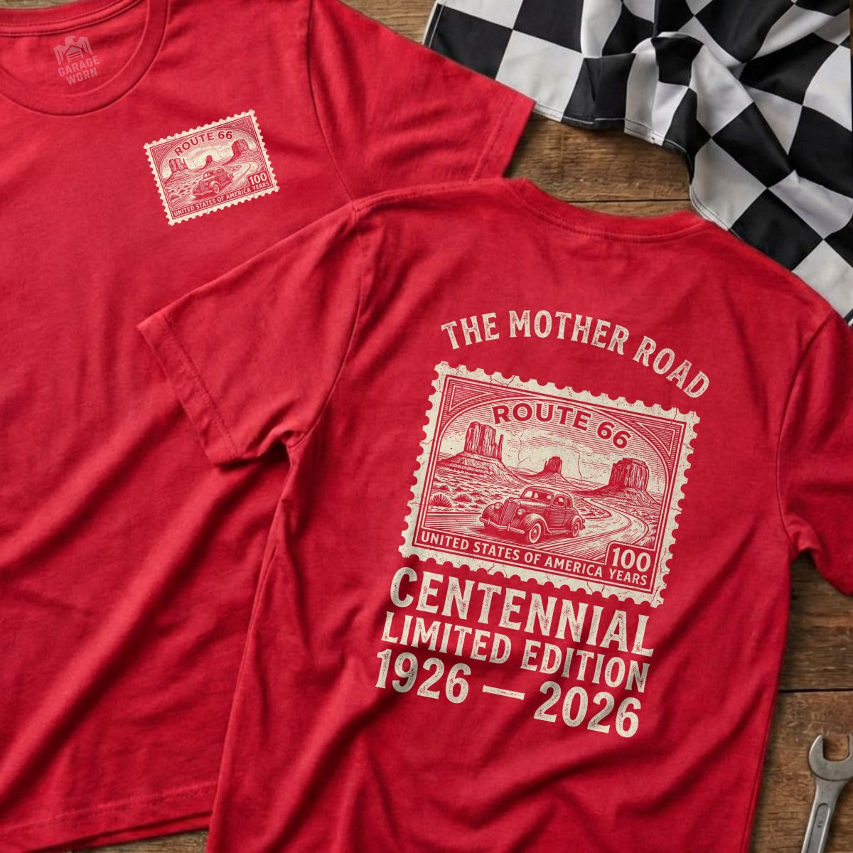 Red t-shirt with Route 66 Centennial design featuring a postage stamp and desert landscape.