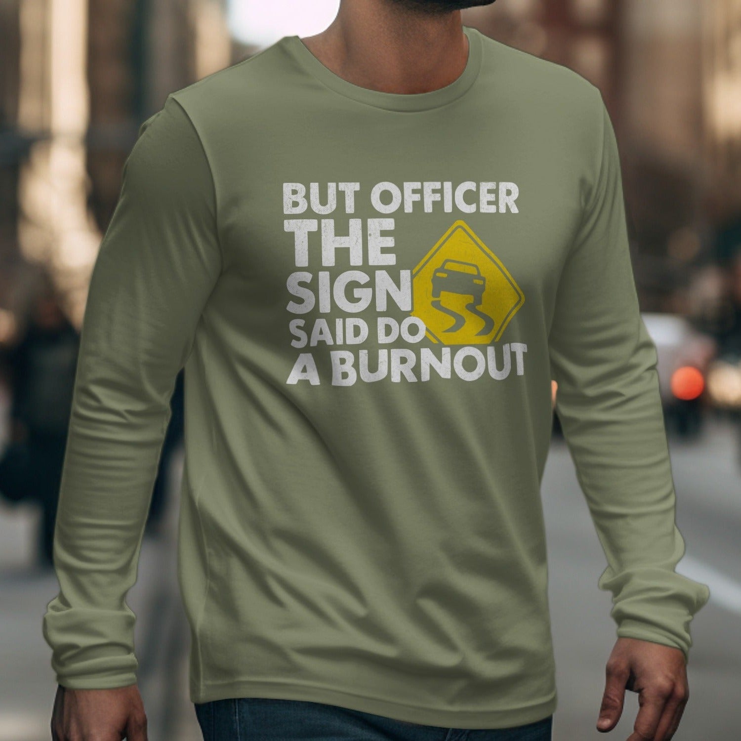 Long sleeve shirt with "BUT OFFICER THE SIGN SAID DO A BURNOUT" text.