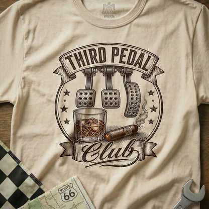 T-shirt graphic with "Third Pedal Club," car pedals, whiskey, and cigar.
