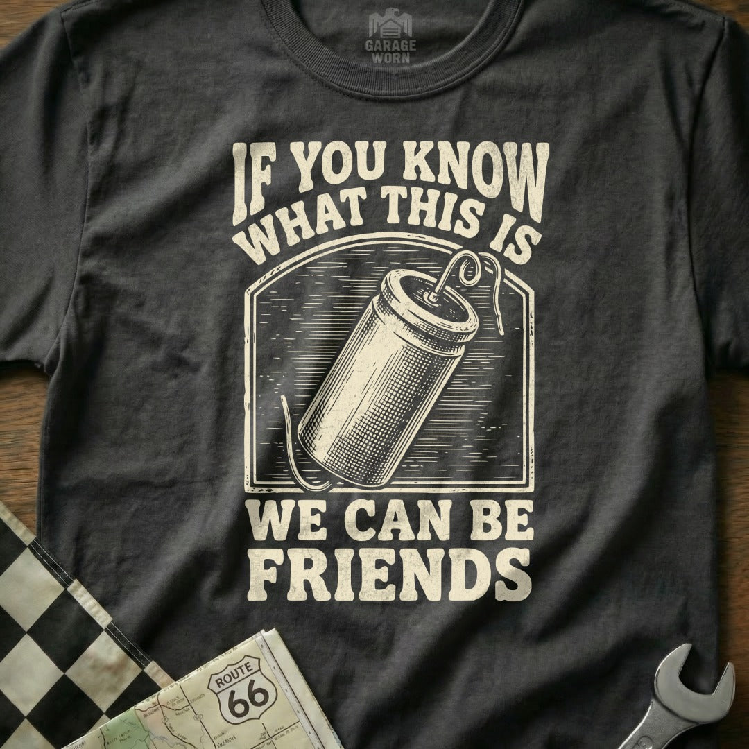 Black t-shirt with text "If you know what this is, we can be friends" and an illustration of a fuse.