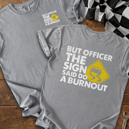 Grey t-shirt with "But officer, the sign said do a burnout" and graphic.