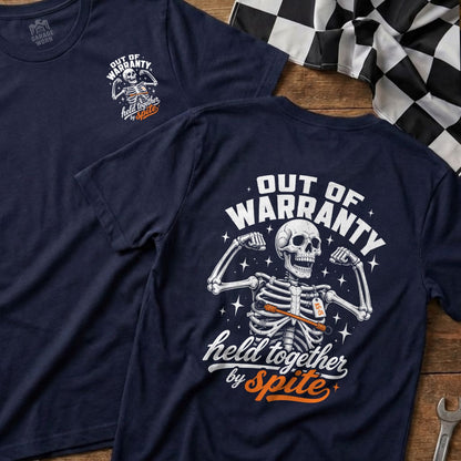 Dark blue t-shirt with "Out of Warranty Held Together By Spite" skeleton graphic.
