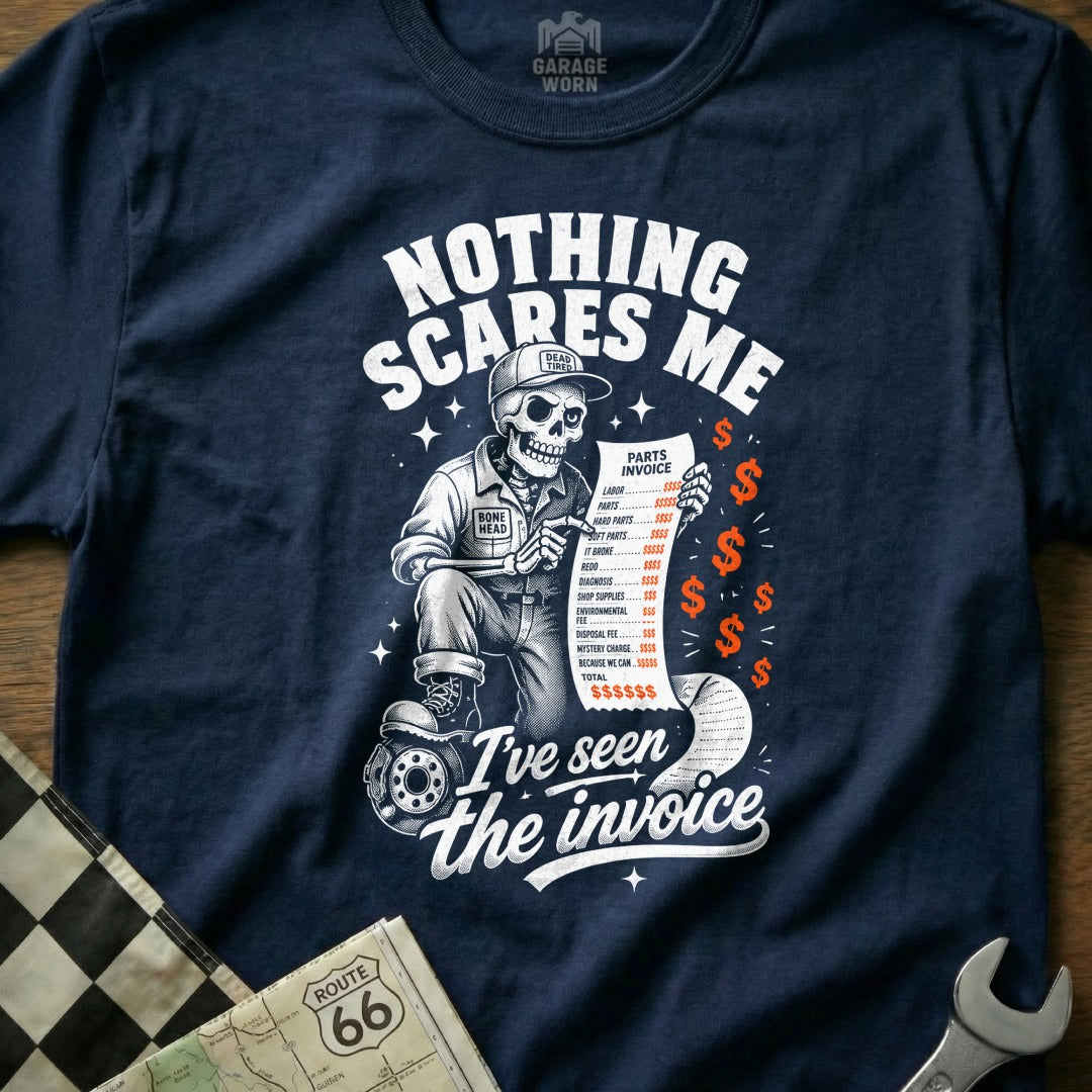 Skeleton mechanic holding an invoice with text "Nothing scares me. I've seen the invoice."