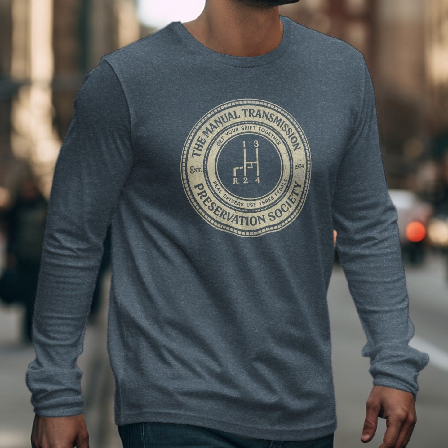 Long-sleeve t-shirt with "The Manual Transmission Preservation Society" text and gear shift graphic.